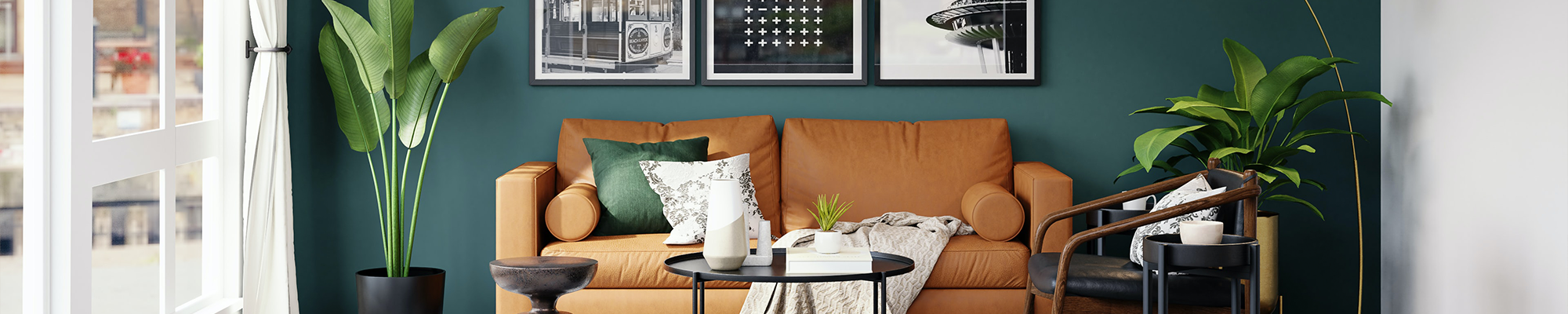 living room with orange couch and houseplants with pictures on the wall from Perge Carpet & Floors in Wheaton, MD